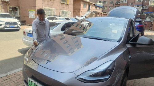 何健为客户上门验车
